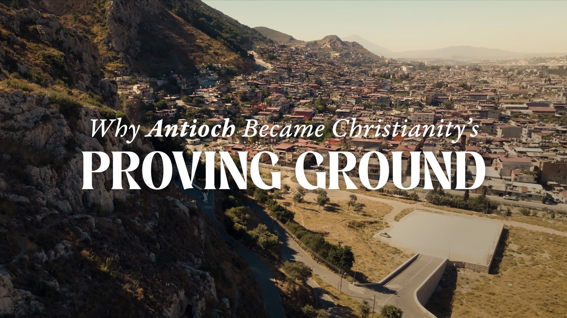 An aerial view of modern Antakya, ancient Antioch, spread across the valley below the mountainside